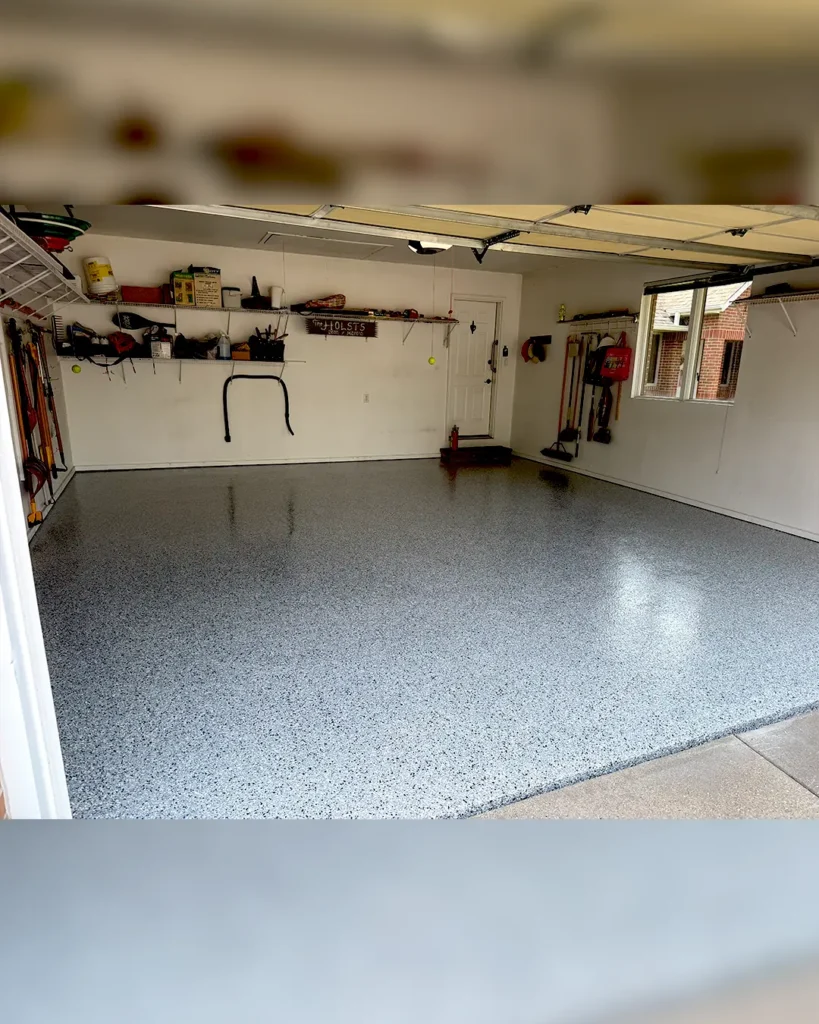 Completed epoxy flooring installation inside an Iowa garage