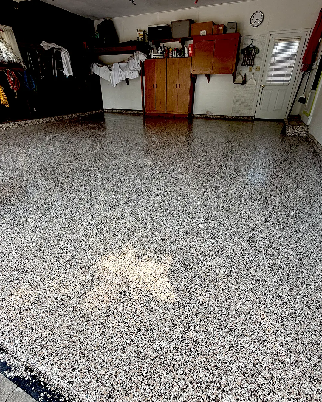 Finished garage epoxy flooring viewed from inside the garage